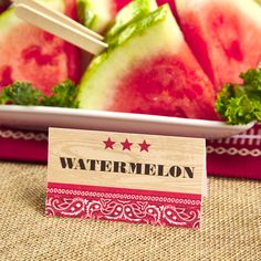 watermelon slices and chopsticks on a plate