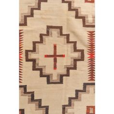 an old native american rug with crosses on it