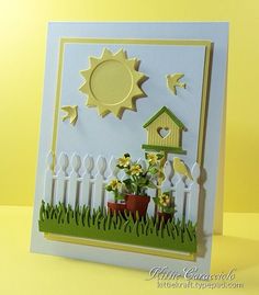 a card with flowers and a birdhouse on the fence in front of yellow background