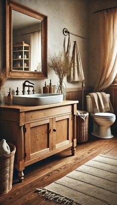 a bathroom with a toilet, sink and mirror in it's corner next to a rug