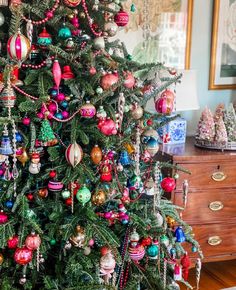 a decorated christmas tree in a living room