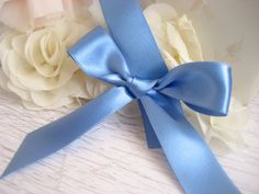 Assorted Blue Satin Double Sided Ribbons. This is the highest quality satin ribbon in a very hard to find color. We have navy, cornflower, aqua, light blue, medium blue, steel blue. This is a deluxe satin two sided ribbon. It is a little more money per yard but the quality of this ribbon is worth it. Feel it and you will agree! It is very popular for bridal designs, crafting, party planning and more. I have several more subtle satin colors in my shop--blush, candlelight, bridal ivory, champagne, Satin Sashes With Ribbon For Gift, Satin Colors, Crafting Party, Blush Flowers, Flower Girl Basket, Wedding Ribbon, Find Color, Satin Color, Blue Steel