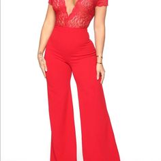 Red Lace Jumpsuit Low Cut Wide Leg Top Half Is See Through Never Worn Short Sleeve Stretch Jumpsuits And Rompers For Party, Stretch Short Sleeve Jumpsuits And Rompers For Party, Party Stretch Short Sleeve Jumpsuits And Rompers, Party Stretch Jumpsuits And Rompers With Short Sleeve, Red V-neck Bodysuit For Spring, Spring Red V-neck Bodysuit, Solid Color Short Sleeve Bodysuit For Party, Red Fitted V-neck Bodysuit, Fitted Red V-neck Bodysuit