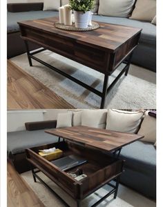 the coffee table is made out of wood and has an open drawer underneath it for storage