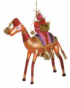 an ornament shaped like a horse with presents on its back