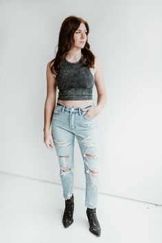 Look your best in Stacy's Mom Jeans! These high-waisted rigid mom jeans feature a flattering silhouette with distressed detailing at the back. The 11" rise and 27" inseam have been modeled in size 3/25 to ensure a perfect fit. Set the trend and make a statement in Stacy's Mom Jeans! Everyday High Rise Distressed Jeans, High Waist Distressed Light Wash Cropped Jeans, High Waist Light Wash Distressed Cropped Jeans, Fitted Light Wash Distressed Cropped Jeans, High Waist Distressed Cropped Jeans In Light Wash, Ripped High Rise Cropped Jeans In Rigid Denim, Ripped High-rise Cropped Jeans In Rigid Denim, Everyday Ripped High Waist Jeans, High Waist Ripped Jeans For Everyday