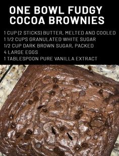 a close up of a chocolate cake on a plate with text above it that reads one bowl fudgey cocoa brownies