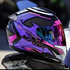 a helmet is shown on the back of a motorcycle