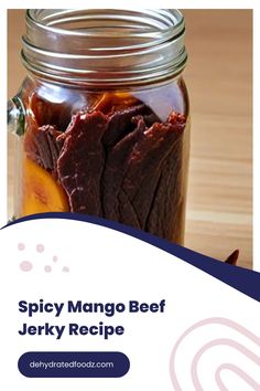 Spicy mango beef jerky in a glass jar, showcased with a recipe title and website link.