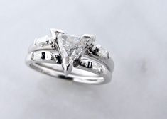 a princess cut diamond ring set in white gold