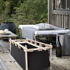 an outdoor patio with furniture and bottles on it