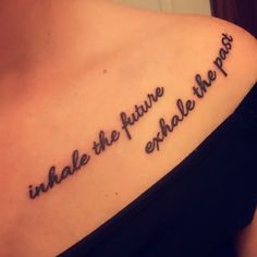 a woman with a tattoo that says, inhale the future is out there on her chest