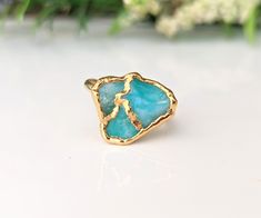 "CUT-OFF DATE TO RECEIVE YOUR ORDER BY CHRISTMAS: Sunday December 10th, 2023 All orders received AFTER December 10th will be created and shipped after the Christmas Holidays. This stunning Aqua blue raw Opal ring is part of my new collection of Kintsugi* jewelry and features a natural raw Peruvian Opal - uniquely handcrafted by electroforming on a 14k Gold filled band and final plated in 18k Gold - A stunning Statement ring sure to make a perfect gift on Special occasions such as Birthday, Anniv Unique Yellow Gold Turquoise Ring For Gift, Blue Hand Forged Rings As Gift, Blue Fusion Style Rings As A Gift, Handmade Emerald Ring Gift, Kintsugi Ring, Kintsugi Jewelry, Christmas Sunday, Raw Opal Ring, Gold Opal Ring