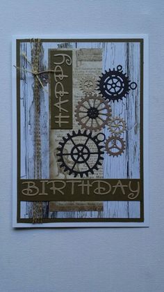 a birthday card with gears and words on the front in brown, black and white