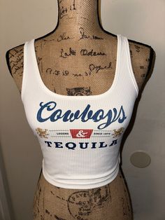 "Cowboys and Tequila" white tank top featuring coors! Perfect for summer time, bathing suit cover up! Any occasion!  Beer shirt. Breathable material. Western wear, country concert, wash on cold and delicate setting for longevity! Visit my page for similar styles!  Feel free to message me with any questions and I'm sure we can work something out! Country Music Outfits, Country Outfits Women, Summer Crop Top, Tequila Shirt, Cowboy Shirt, Rodeo Outfits, Country Concert Outfit, Tank Top Outfits, Tank Top White