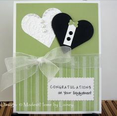 a handmade congratulations card with two hearts