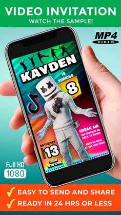 a person holding up a cell phone with an advertisement for the game kadyn