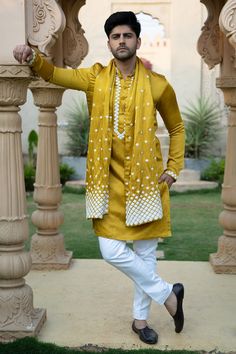 Mustard satin linen kurta with contrast off white thread work. paired with straight pant and embroidered stole.
Components: 3
Pattern: Embroidered
Type Of Work: Geometric
Neckline: Mandarin
Sleeve Type: Full
Fabric: Satin Linen
Color: Yellow
Other Details: 
Front buttons
Thread work
Occasion: Wedding - Aza Fashions Kaaj Button, Haldi Ceremony Outfit For Men, Casual Wedding Suit, Kurta Set With Dupatta, Haldi Ceremony Outfit, Sherwani For Men Wedding, Plain Yellow, Wedding Kurta For Men, Groom Dress Men