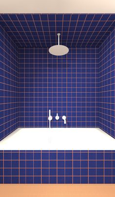 an empty bathroom with blue tile walls and floor