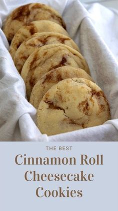 cinnamon roll cheesecake cookies in a basket with text overlay that reads, the best cinnamon roll cheesecake cookies