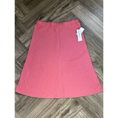 This Liz Claiborne Midi Skirt In Pink Is Perfect For A Casual Summer Occasion. The Skirt Is Made Of A Blend Of Rayon And Linen, And Features A Solid Pattern With A Flare Style. It Has A Pull-On Closure And Is Lined For Comfort. The Skirt Is A Size M And Is Suitable For Regular Size Women. The Barbie Character Can Be Seen In The Design, Making It A Great Addition To Any Barbiecore Or Girly Wardrobe. Casual Pink Cotton Skirt, Pink Skirted Skort With Pockets, Knee-length Cotton Skort For Spring, Pink Cotton Skirt With Pockets, Stretch Pink Cotton Skirt, Casual Knee-length Skort For Spring, Pink Mini Skirt For Spring, Casual Pink Knee-length Bottoms, Pink Cotton Skort With Elastic Waistband