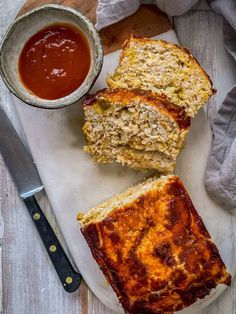 slices of meatloaf on a plate with sauce