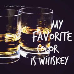 two glasses filled with whiskey sitting on top of a black table next to the words, my favorite color is whiskey