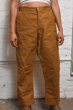 "Vintage 1950s \"Hudson Bay\" Canvas Outdoor Trousers.  High-waisted, fly zipper, four pockets, lined. Good Vintage Condition - small hole along the hip Fits Like Medium  Waist - 31\" Hip - 44\" Rise - 12.5\" Inseam - 26\"" Retro Bottoms With Belt Loops And Relaxed Fit, Vintage Cargo Pants With Side Pockets And Relaxed Fit, Vintage Relaxed Fit Cargo Pants With Side Pockets, Retro Relaxed Fit Bottoms With Belt Loops, Retro Relaxed Fit Brown Bottoms, Vintage Brown Bottoms With Side Pockets, Retro Brown Bottoms With Relaxed Fit, Retro Brown Cotton Bottoms, Retro Straight Leg Pants With Pockets