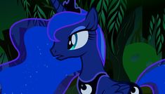 the blue pony is standing in front of some trees and bushes with its eyes wide open