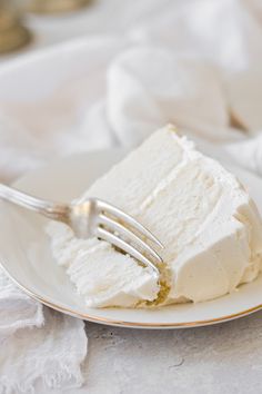 a piece of cake on a plate with a fork