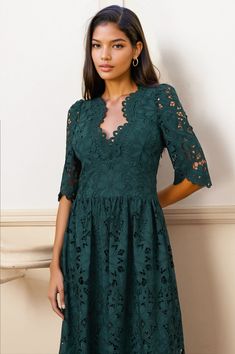 Turn heads in our stunning emerald green lace dress, featuring a flattering V-neckline and delicate scallop lace details. Perfect for any special occasion, this dress exudes elegance and sophistication. A timeless piece that will elevate your evening look. LENGTH: 49" from top of shoulder FABRICATION: 100% POLYESTER STYLE#: DR-21711 SEDONA LACE FOREST-SEDLF-F24 *Dry Clean or wash on cold and hang flat to dry *Model is wearing size XS Emerald Green Lace Dress, Emerald Green Lace, Green Lace Dress, Green Lace Dresses, Nature Dress, Yumi Kim, Daytime Dresses, Green Lace, Solid Dress