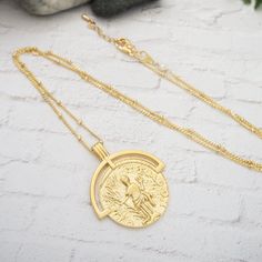 Vintage coin medallion necklace Details: - large gold plated medallion - gold plated satellite chain Dimension: Medallion: 30mm x 35 mm (1.25 inch x 1.5 inch) Chain length : 20 inch + 1 inch extension Gold-tone Medallion Necklace With Coin Pendant, Gold Plated Medallion Locket Necklace, Gold Medallion Necklace With Large Pendant, Gold Plated Medallion Coin Necklace With Adjustable Chain, Gold Plated Medallion Coin Necklace With Clavicle Chain, Gold Plated Medallion Chain Necklace, Gold-tone Tarnish Resistant Medallion Necklace, Medallion Necklace, Coin Necklace