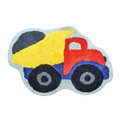 a rug with a toy truck on it in the shape of a handmade pillow