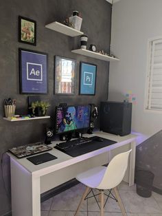 a white desk topped with a computer monitor and keyboard