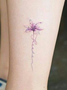 a small flower tattoo on the ankle that says, i love you in cursive writing