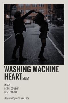 two people standing in the middle of a street with text that reads, washing machine heart 2013