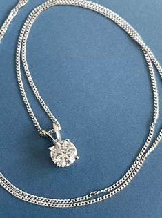 Straight from the heart of London Hatton Garden, here we have an amazing 1.10ct Round brilliant cut diamond necklace Classic and dazzling - 6mm  large natural diamond. 1.10ct Diamond - A stunning piece SI clarity - fiery and sparkling. G/H colour 18" Chain Hallmarks on the chain clasp and stamped on pendant Bespoke made. Brand new with tag Retail price £3900 - it ll come with insurance valuation exceptional price We only sell natural diamonds Diamond really catch light and sparkle so you ll get Solitaire Diamond Necklace, Diamond Solitaire Necklace, Solitaire Diamond, G H, Round Brilliant Cut Diamond, 1 Carat, Diamond Solitaire, Chains Necklace, Natural Diamonds