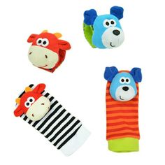 three pairs of socks with animals on them and one has a striped sock in the shape of a cow