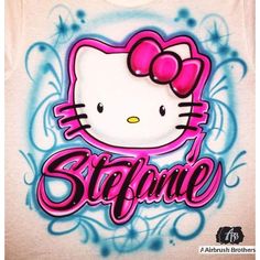 a hello kitty shirt with the word surprise painted on it