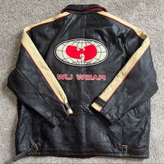 Very Rare Wu-Wear Leather Jacket From The 90’s. Original Wu-Tang Size 4xl. See Pictures For Condition. Back Left Strap Is Not Connected But Does Not Affect How You Wear The Jacket. From A Non Smoking Pet Free Home. Get This Wu Gem Now Before It’s Gone! Check Out My Other Wu Items Follow My Ig Hieuwear (For Discounts) 90s Style Leather Jacket For Winter Streetwear, Retro Winter Biker Jacket For Streetwear, Retro Biker Jacket For Winter Streetwear, 90s Style Leather Jacket For Fall Streetwear, Vintage Biker Jacket For Winter Streetwear, Vintage Leather Jacket For Winter Streetwear, Wu Wear, Wu Tang, Very Rare