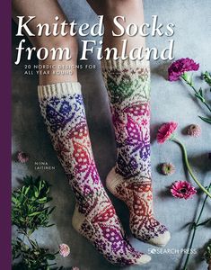 the cover of knitted socks from finland is shown next to some flowers and plants