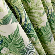 green and white curtains with leaves on them