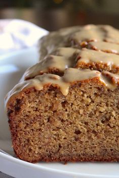 there is a bundt cake with white icing on it