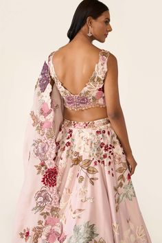 The pink lehenga is created with multicolor threadwork embroidery is embellished with sequin, cutdana, beads and stones. It is paired with classic blouse and dupatta with thread and bead work. Thread Work Lehenga Embroidery, Thread Work Lehenga, Threadwork Embroidery, Sequence Lehenga, Saffron Spice, Bridal Indian, Sangeet Outfit, Floral Lehenga, Classic Blouse