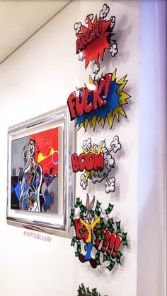 the wall is decorated with various cartoon characters