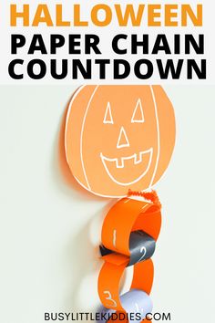 an orange paper chain with a jack o lantern on it and the words halloween paper chain countdown