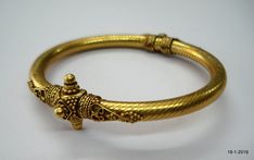 "sterling silver gold vermeil gold gilded Bangle Bracelet from Rajasthan India. great handmade design good for jewelry collection. Note - Please check pictures carefully for more detail. Inner diameter side to side - 5.8 cm(2.28\") Inner circumference - 17 cm (6.7\") width max. - 7 mm weight - 20 grams Material - sterling silver gold plate on top." Antique Gold Bangle For Gift, Gold Ornate Brass Cuff Bracelet, Formal Gold Byzantine Bracelets, Gold Brass Bangle In Temple Jewelry Style, Gold Temple Jewelry Cuff Bracelet As Gift, Yellow Gold Brass Bangle With Intricate Design, Handmade Gold Byzantine Bracelet, Gold Byzantine Bracelets For Ceremonial Occasions, Gold Temple Jewelry Cuff Bracelet For Gift