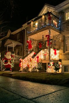 a house decorated with christmas lights and decorations