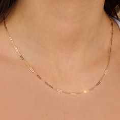 Your boyfriend denim just found its match. It’s handcrafted in 14k solid gold. Raw, loose, and bold. Add a charm, layer it up or wear it solo. This stunning chain is sure to make a huge fashion statement. Adjustable up to 18" chain 14K Solid Gold Link Length: 6.5 mm. Width: 1.7 mm Clasp: Lobster Trendy 14k Gold Jewelry With Delicate Chain, Everyday Yellow Gold Chain Link Charm Necklace, Minimalist 14k Gold Charm Necklace With Gold Chain, Minimalist 14k Gold Charm Necklace, 14k Gold Link Charm Necklaces For Everyday, Everyday Figaro Chain Charm Necklace, 14k Gold Link Chain Charm Necklace, Everyday Charm Necklace With Figaro Chain, Everyday 14k Gold Link Charm Necklaces