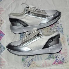 Franco Sarto Imperial Sneakers Brand New Never Worn Size 8 ,9 ,6.5 Women's Metallic Accents Side Zipper Distressed Finish White, Gray, And Metallic Color Thank You For Visiting My Closet!!!!1f Silver Synthetic Casual Sneakers, Trendy Silver Synthetic Sneakers, Casual Silver Synthetic Sneakers, Silver Synthetic Round Toe Sneakers, Modern Silver Synthetic Sneakers, Trendy Silver Slip-on Sneakers, Metallic Silver Low-top Sneakers For Sports, Metallic Silver Lace-up Casual Sneakers, Silver Low-top Sneakers With Metallic Logo